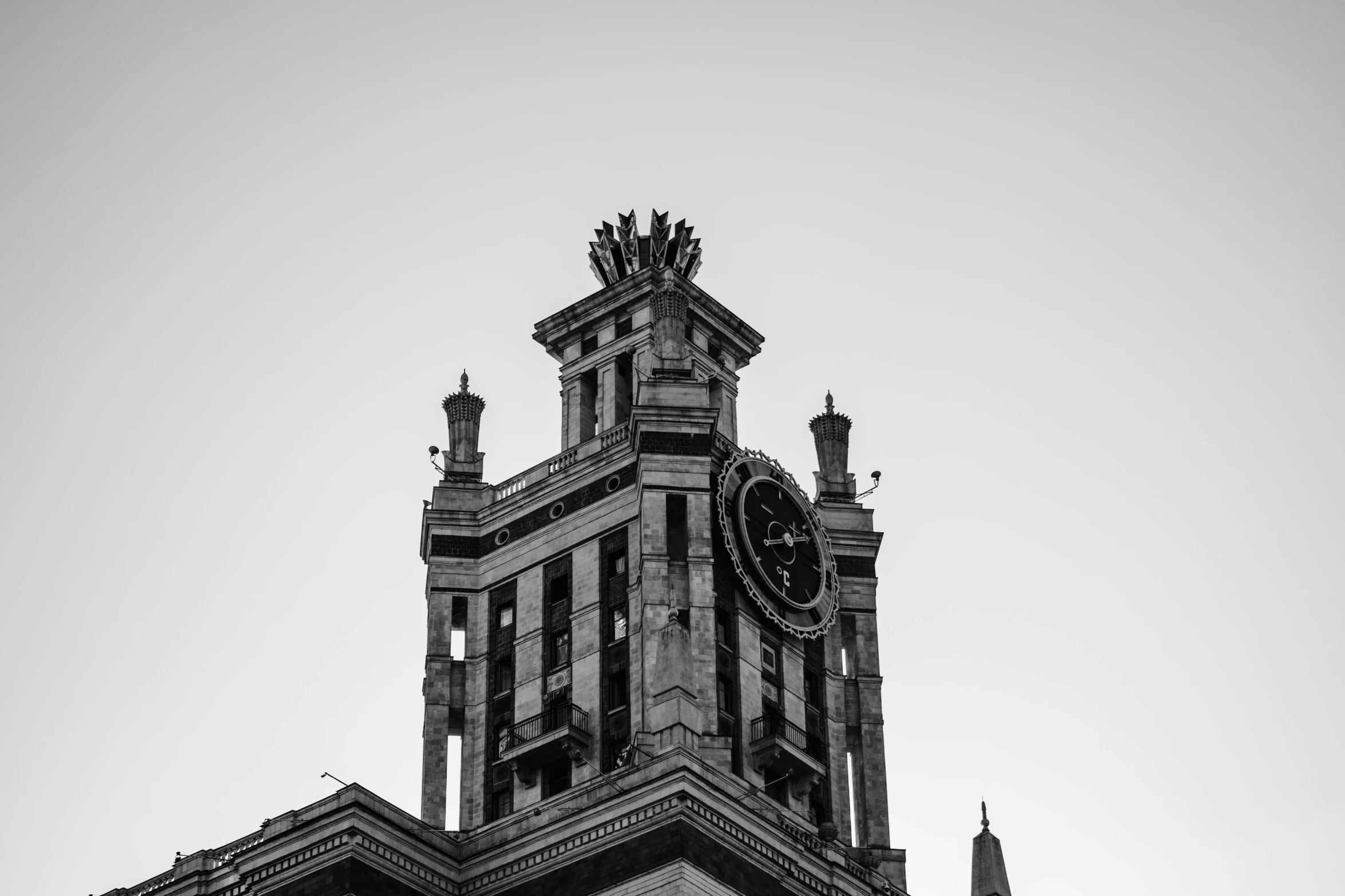 an old clock tower in black and white