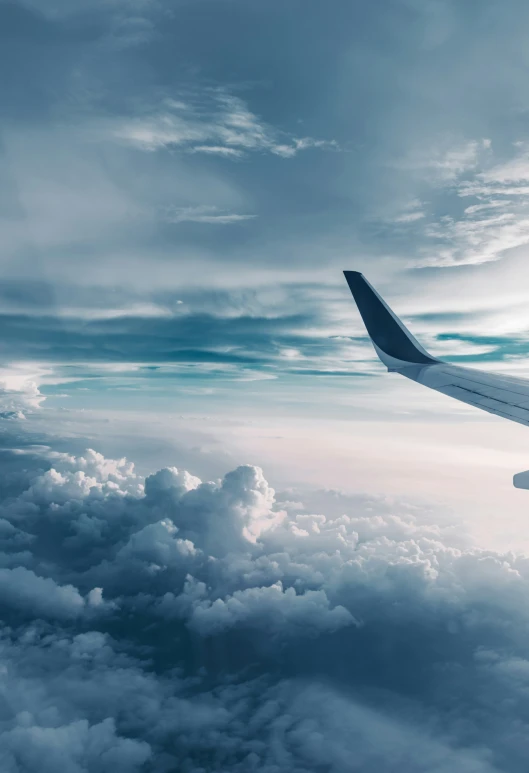 a view of clouds, blue sky, and clouds above