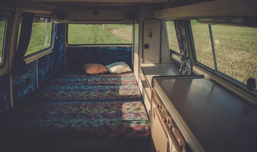 inside the camper van looking out to the grass