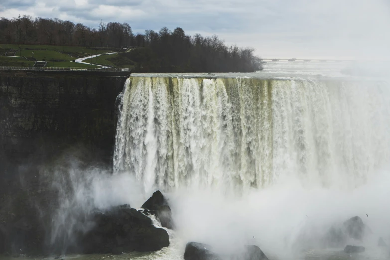 there are several waterfalls that have gushing water into the river