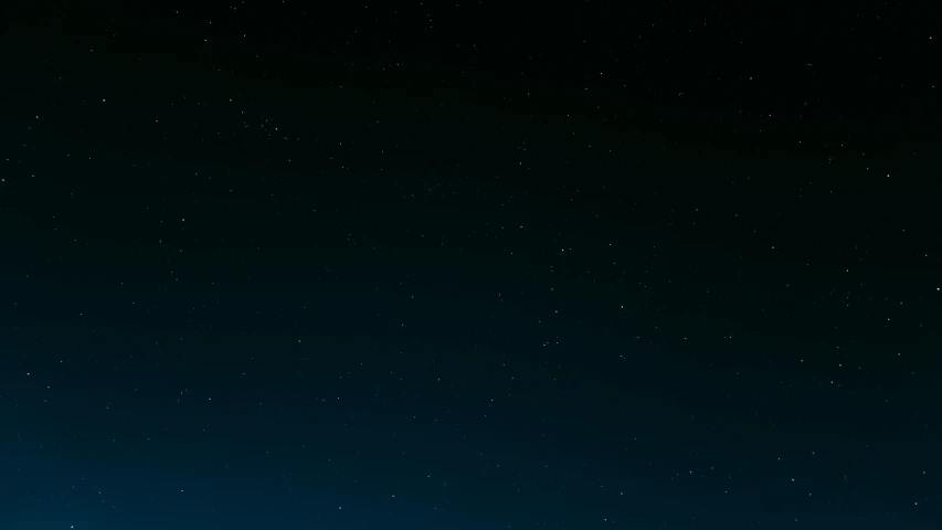 the clear blue sky is lit up with stars