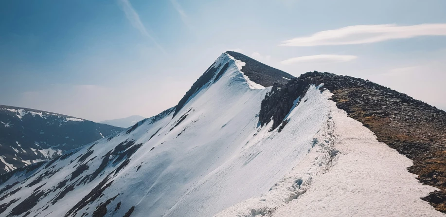 a mountain with a big peak on the top