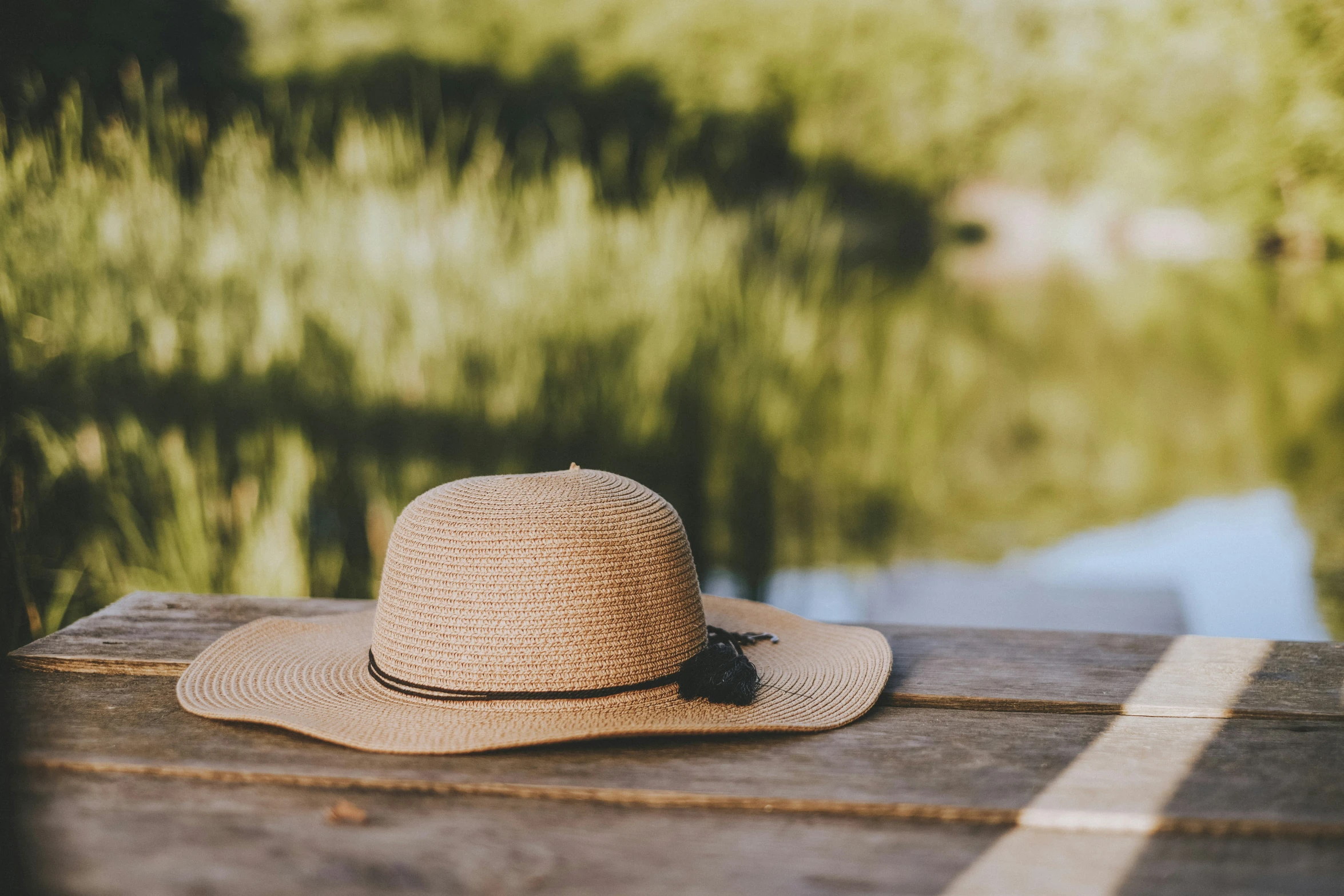 a hat that is sitting on top of a wooden table