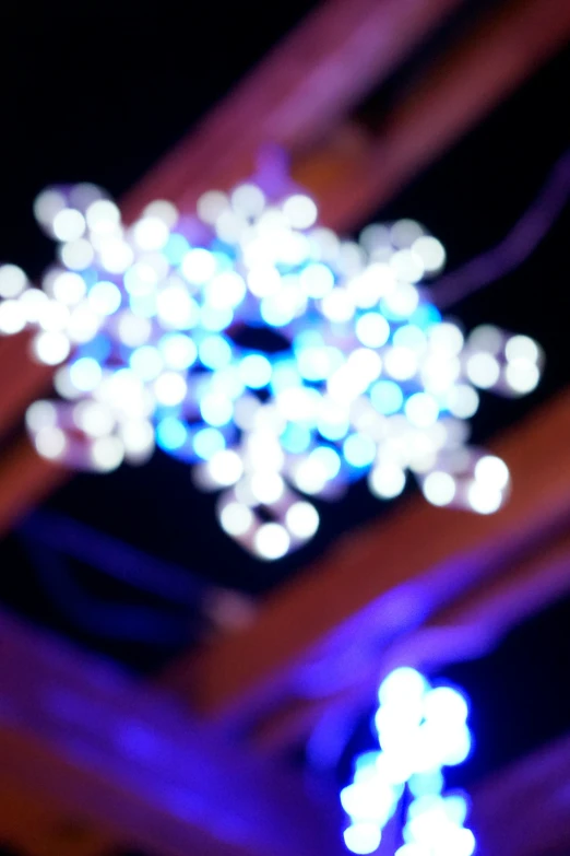 a phone that is up close to some lights