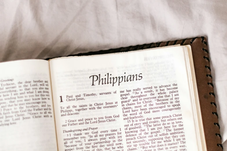 open bible open to the word philippians