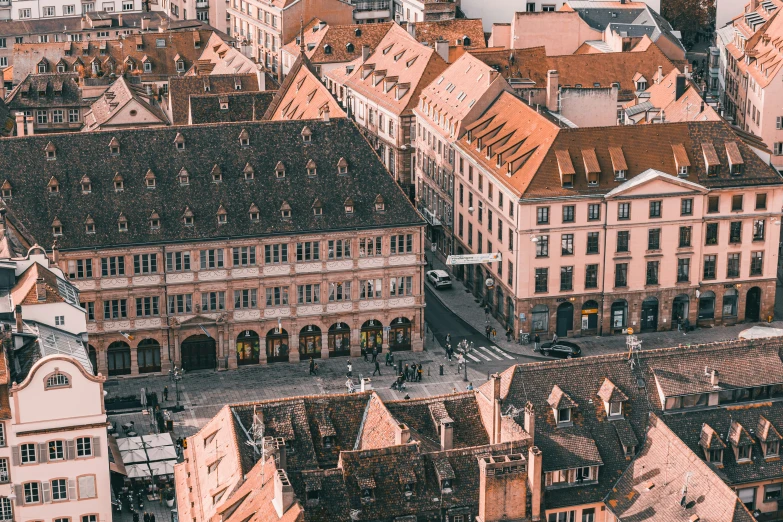 old buildings are in the city square as seen from above