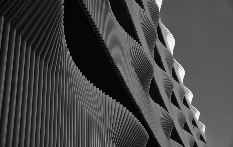 a wall made up of wavy lines in black and white