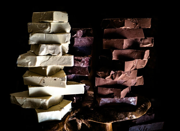 a close up of pieces of cake stacked on each other