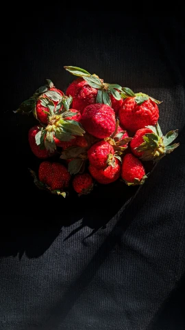 the strawberries are laying in a large pyramid