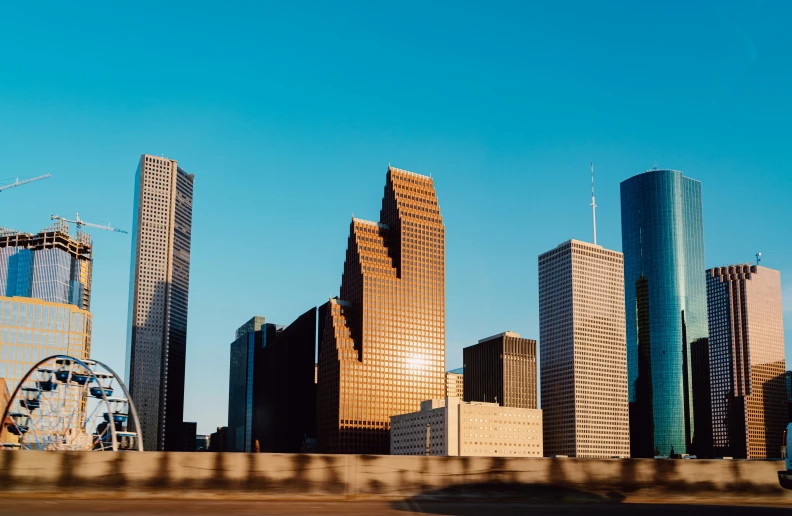 a large city skyline with skyscrs in the background