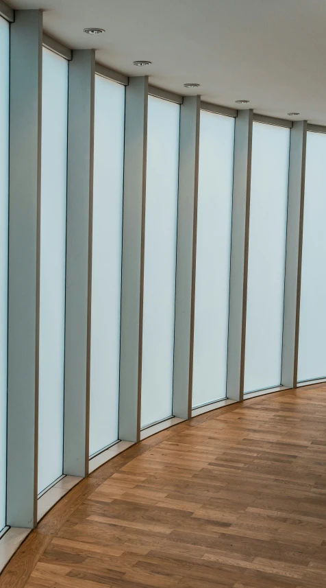 a large glass wall in the middle of a building