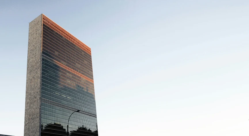 an image of an upward view of a tall building