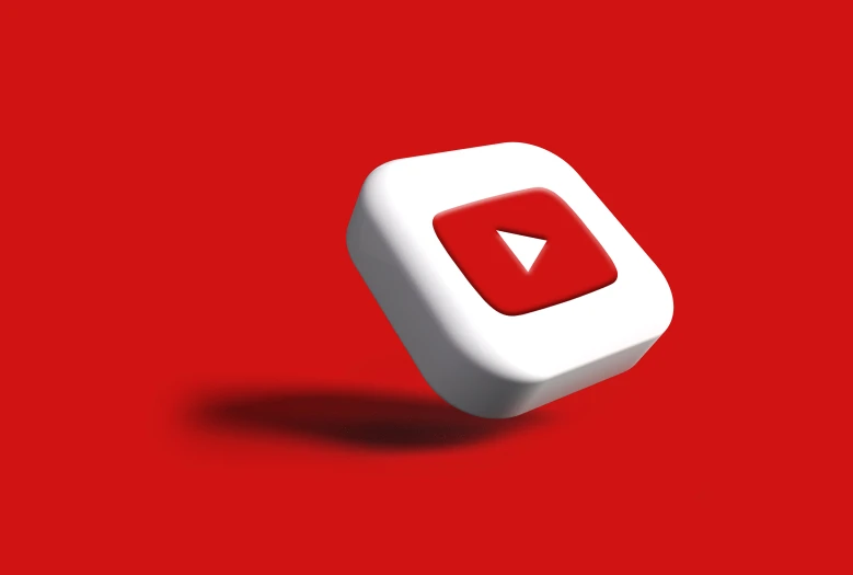 a white object with a red background is shown