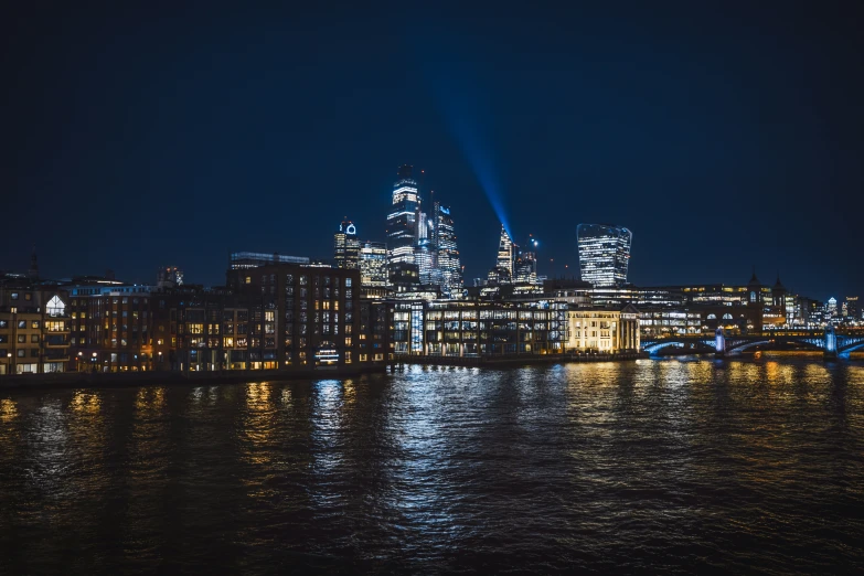 night s of buildings with the lights in the windows