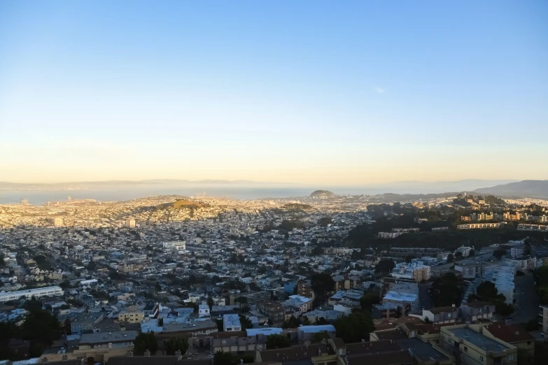 a panoramic view of the city of san francisco from high up on a hill