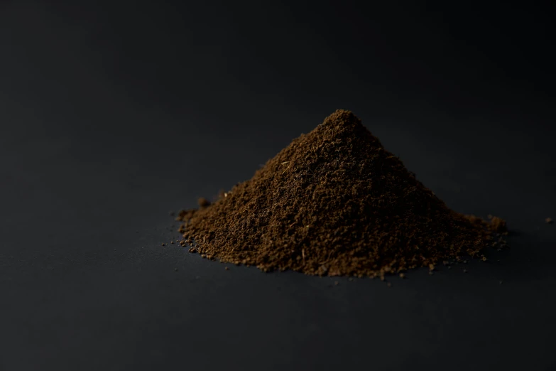 a large mound of dirt on the table