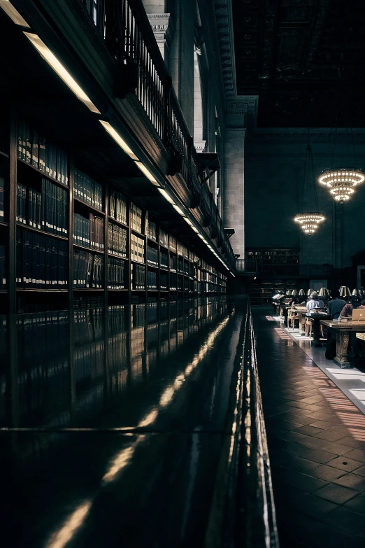 a large long room with a couple of benches next to the wall