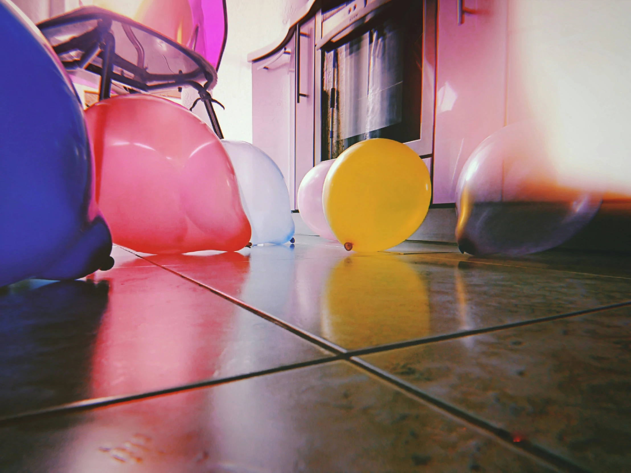 this is a collection of balloon like objects on the floor