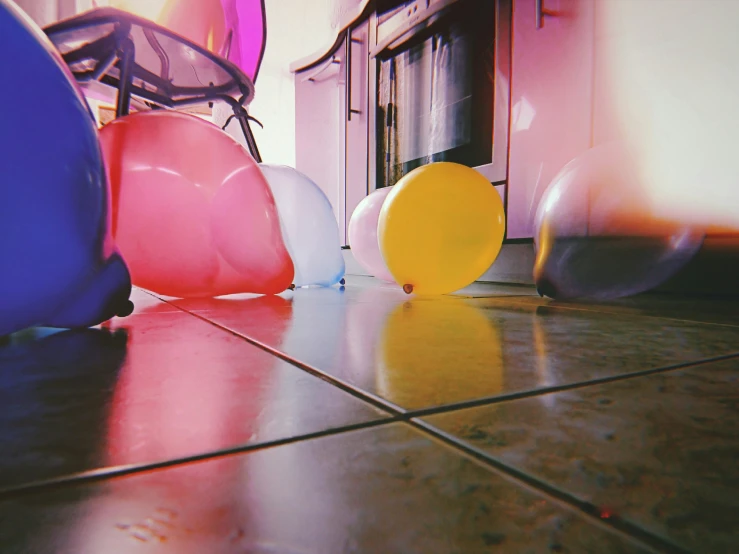 this is a collection of balloon like objects on the floor