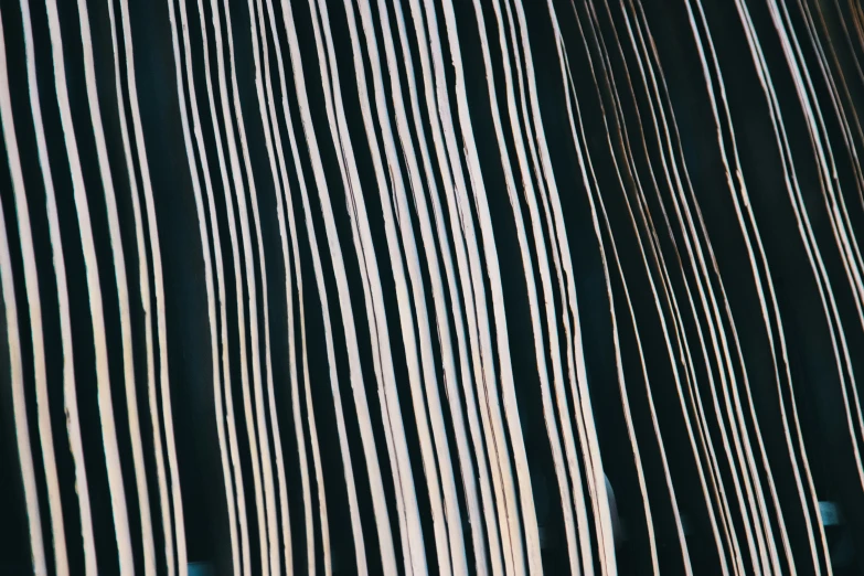 a black background with white stripes and lines
