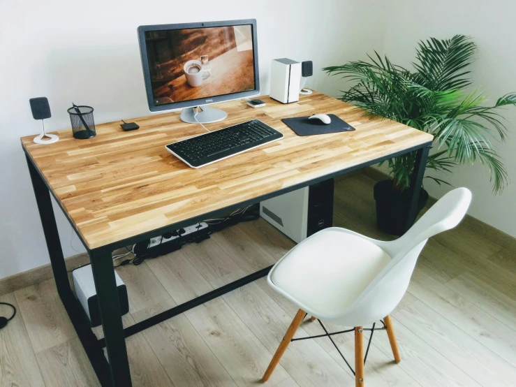 desk that is made of wood and metal