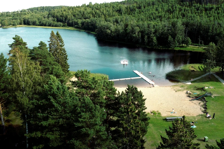 a large body of water surrounded by trees