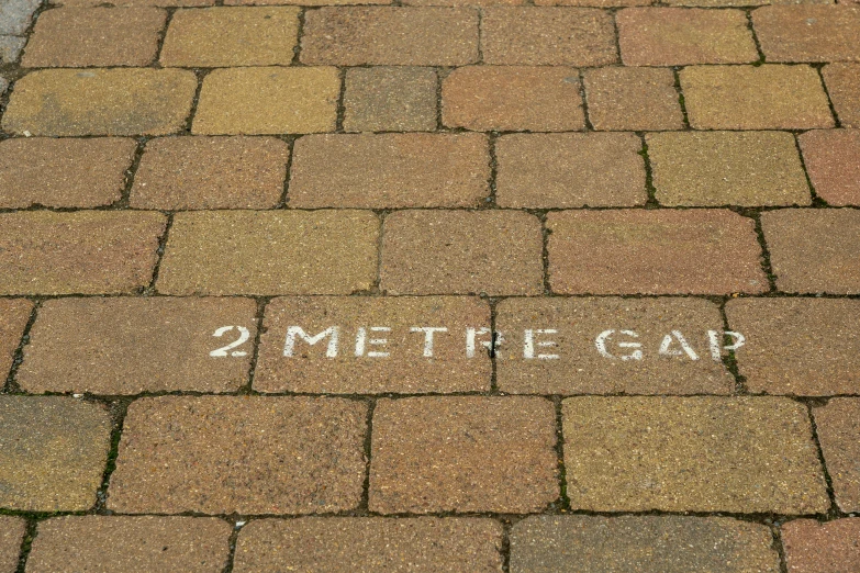 a pavement with a white word that says 2meteod on it
