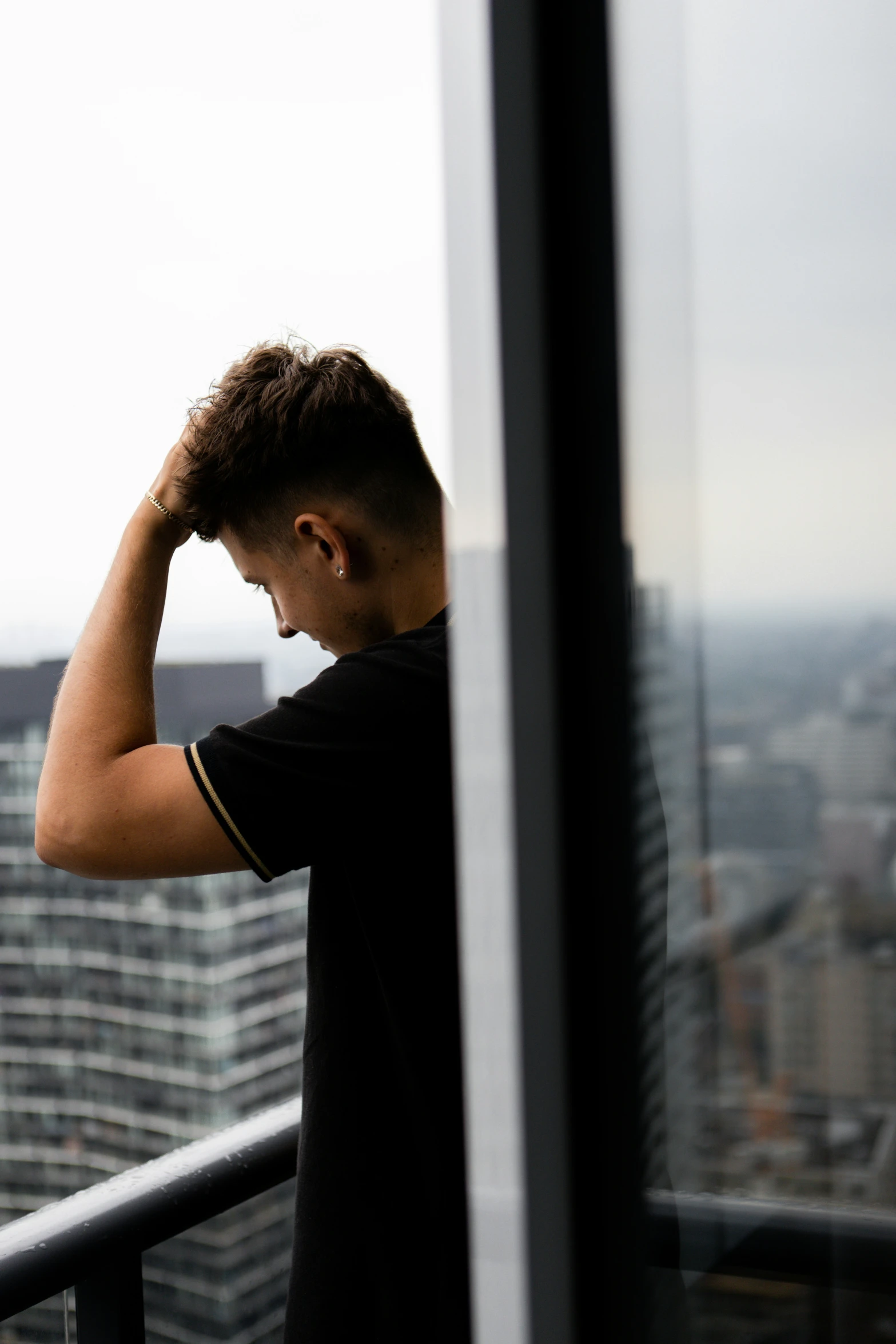 a person is standing outside near the city