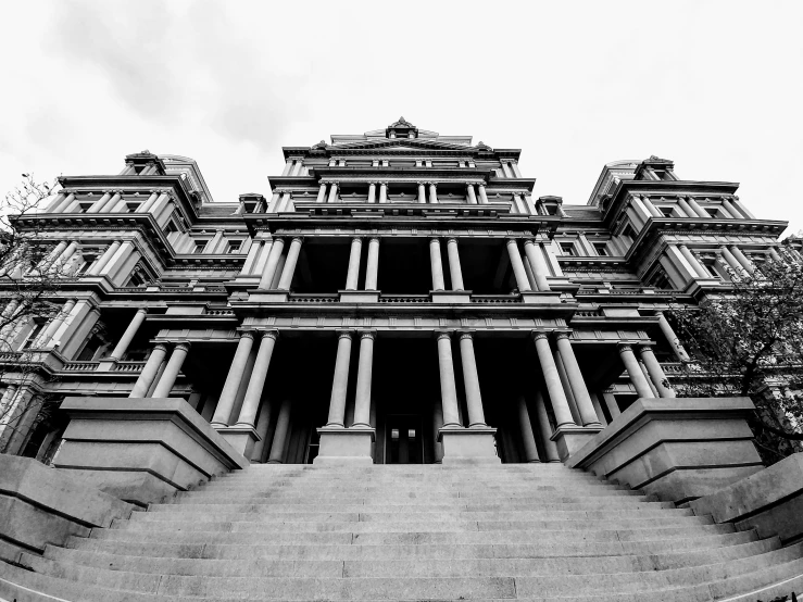 an ornate gothic style building with many steps going up and down it