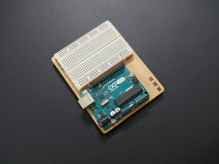 a small electronic device with a keyboard and circuit