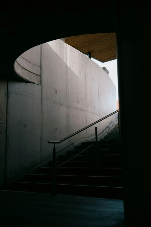 a stairway between two buildings next to stairs