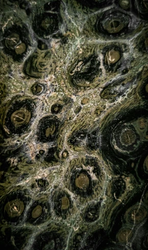 close up of black and green marble or stone texture