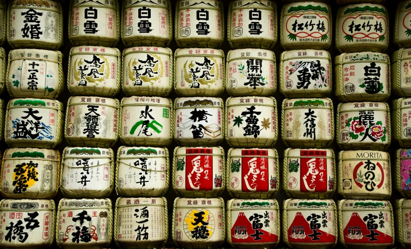 many containers filled with food and oriental writing