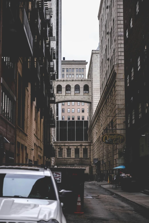 a city street with many tall buildings on the side of it