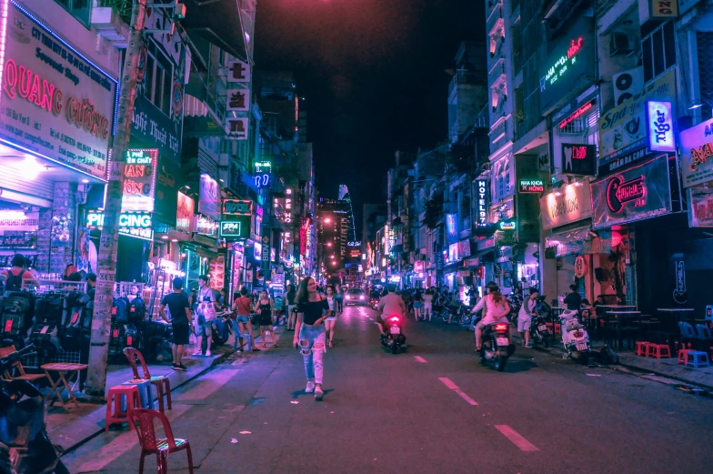 the night lights of a small street in an oriental city