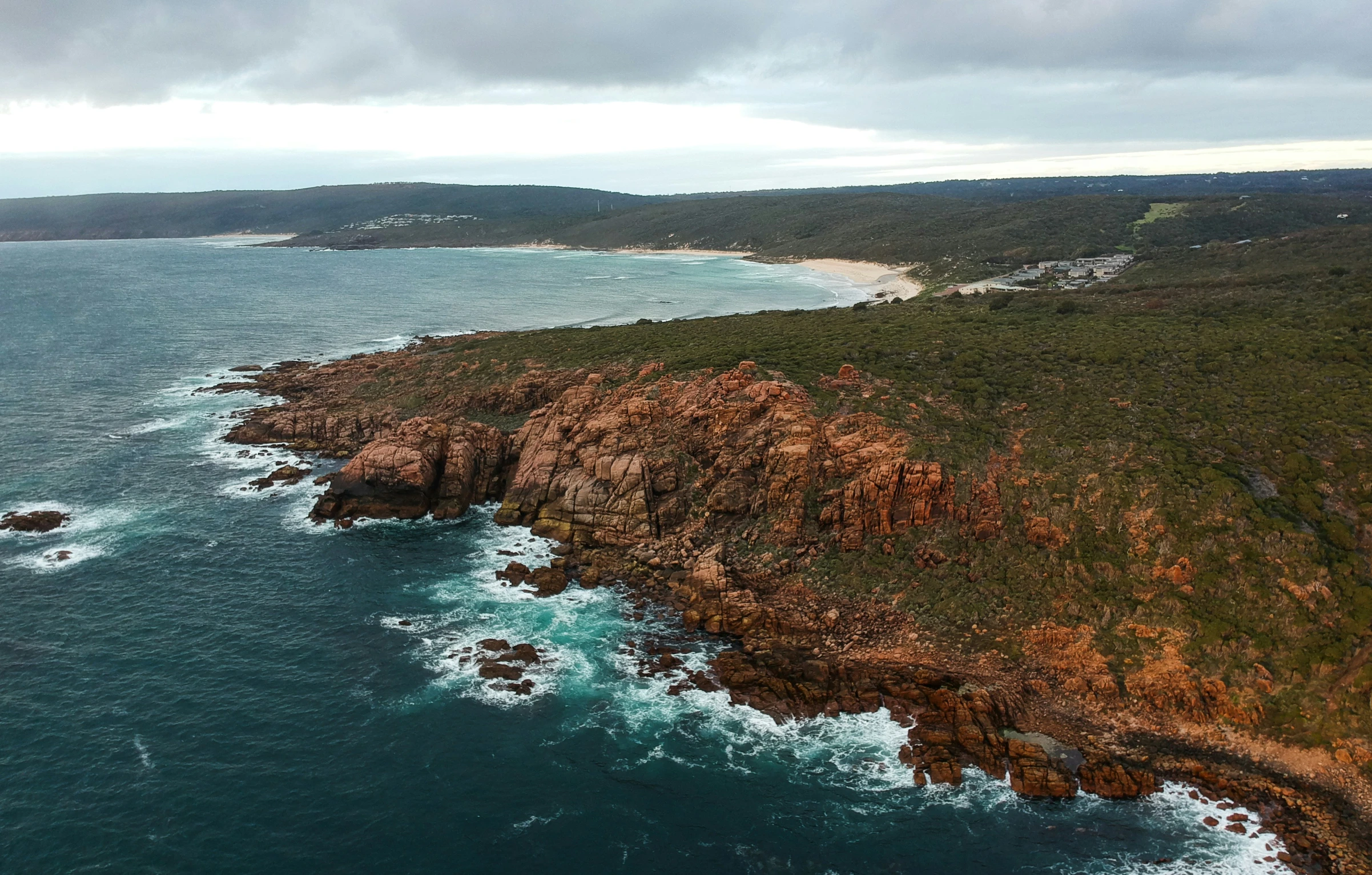 the ocean coast near an island in the middle of nowhere