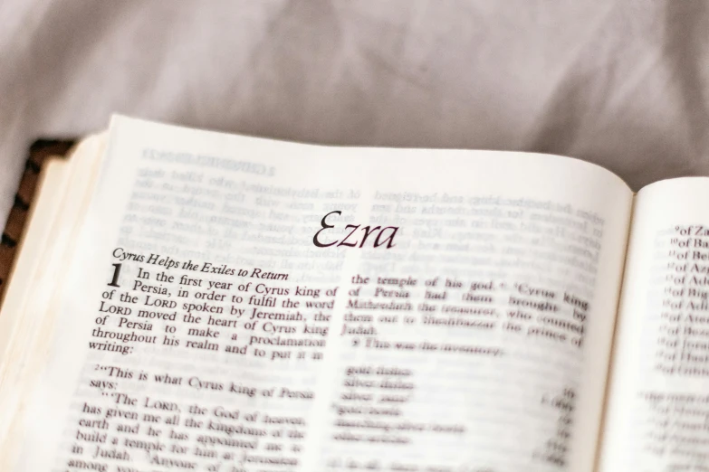 a close up of an open book with the word enr written on it