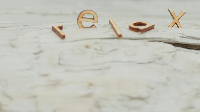 the word ely spelled with gold letter ring