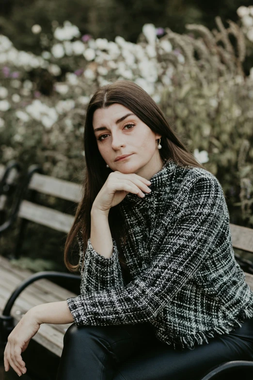 woman sitting on a bench at a park