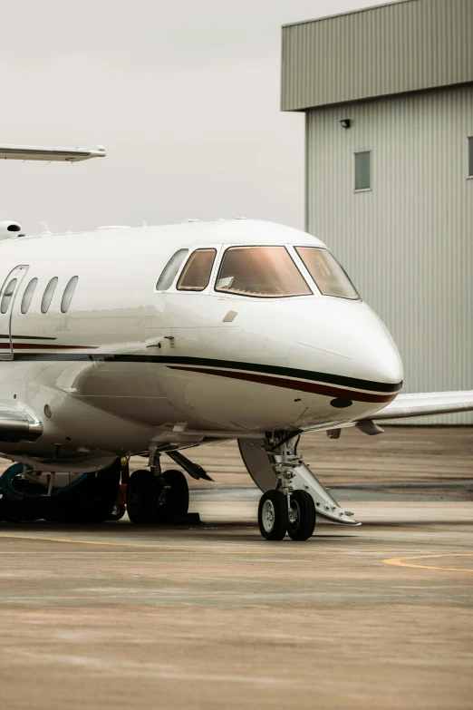 the airplane is being serviced on the tarmac