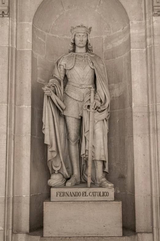 black and white pograph of statue of a king and queen