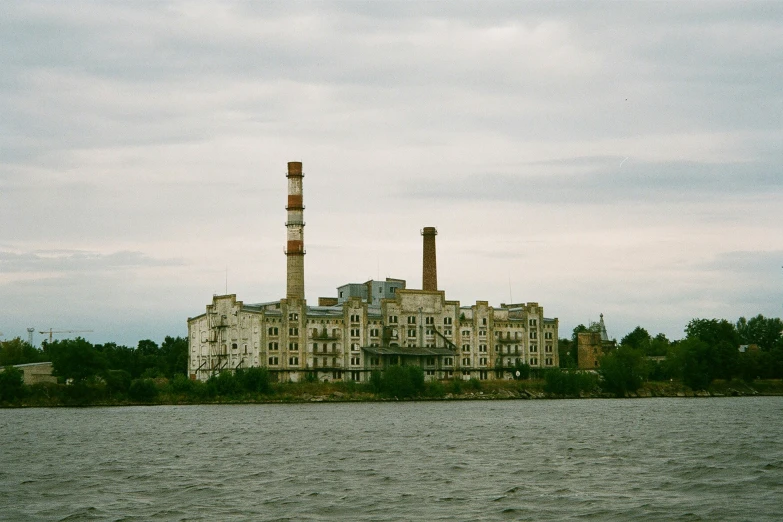 a very big building next to some big water