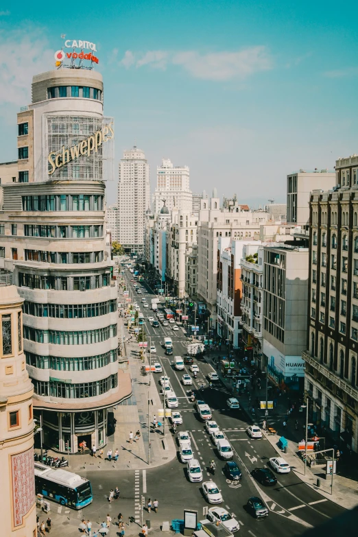 a city skyline view with a bus on the street