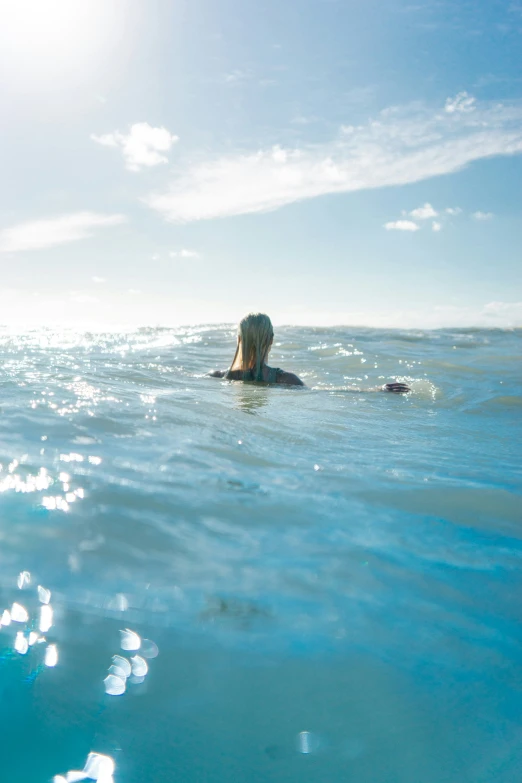 a body of water with several people in it