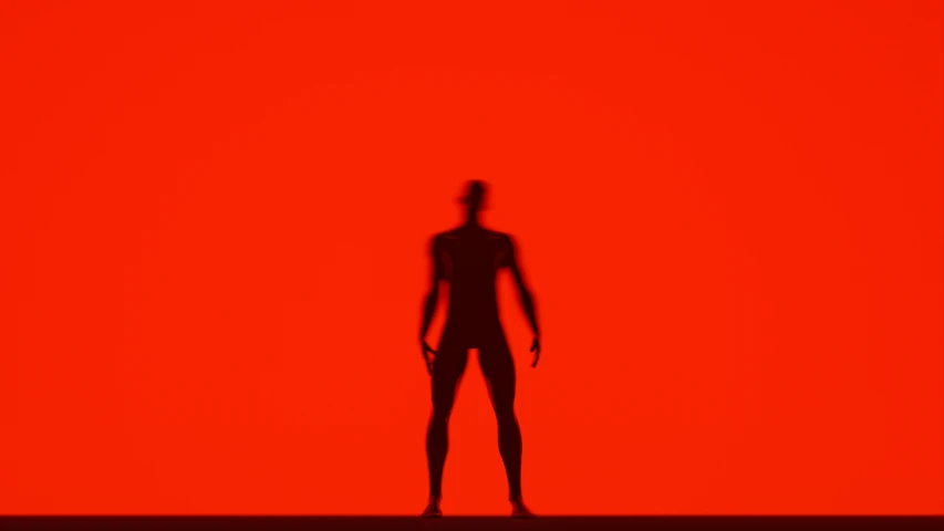 a silhouette of a person against a red backdrop