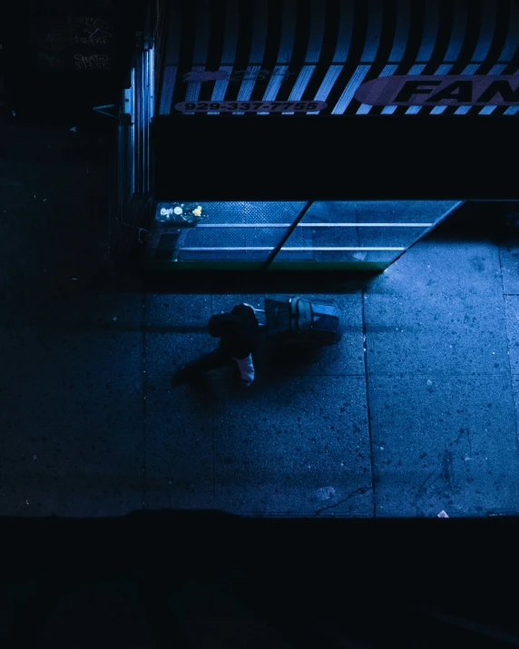 a blue po of some luggage by the door