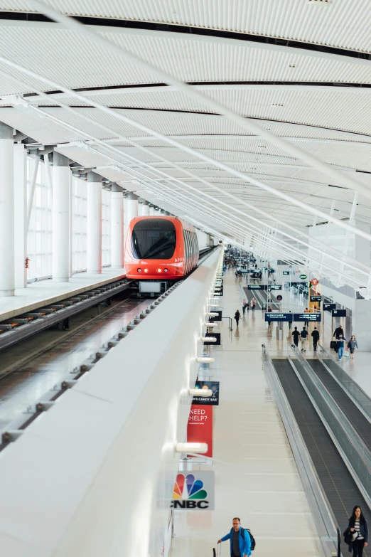 the train is at the station on the track