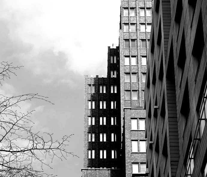 a black and white po of two tall buildings