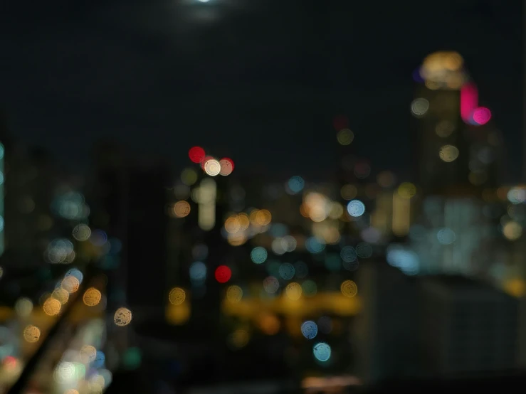 a blurry image shows the city lights