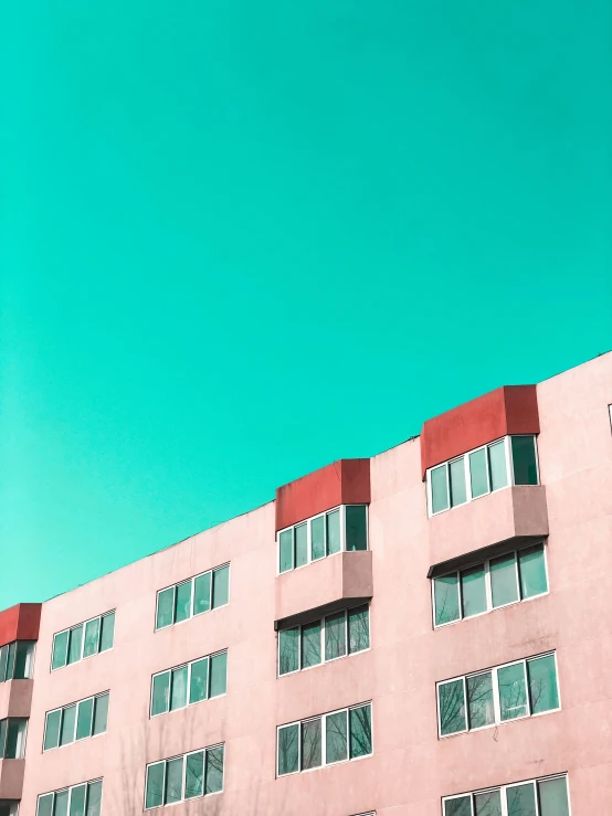 the sky above a large building with windows